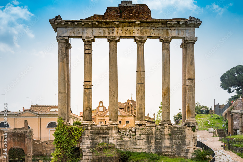 Ruins of the Roman Forum with Temple of Saturn in Rome. Italy capital landmarks.