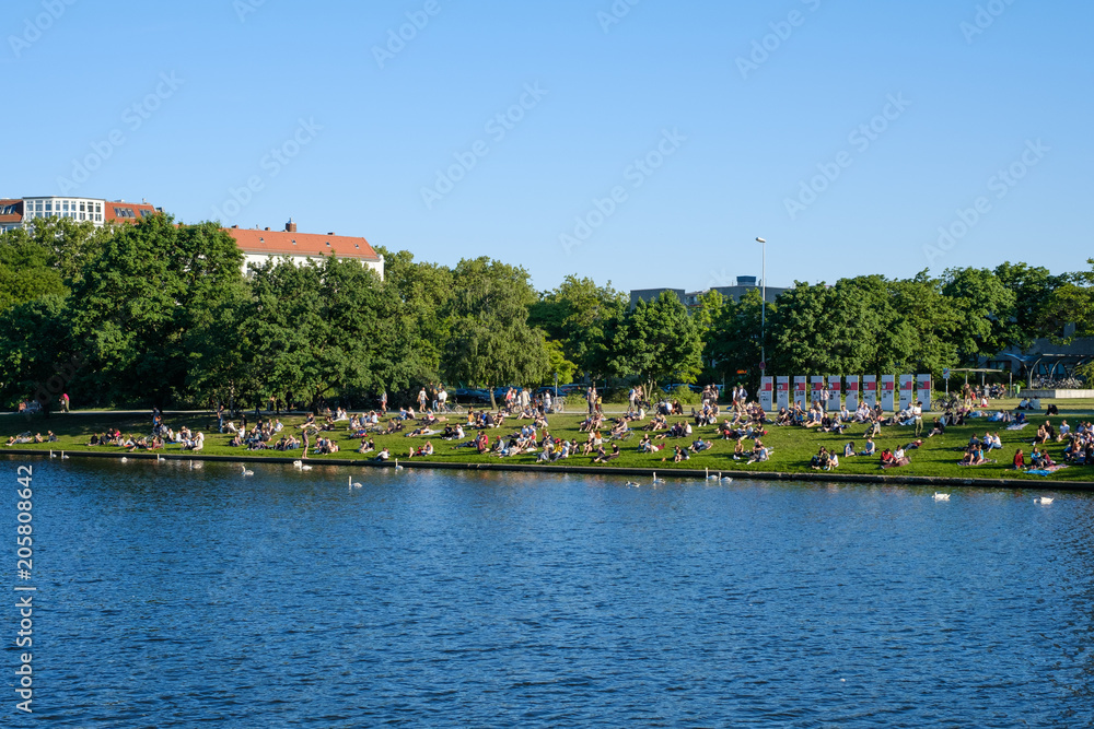 People at riverside  in Berlin Kreuzberg 