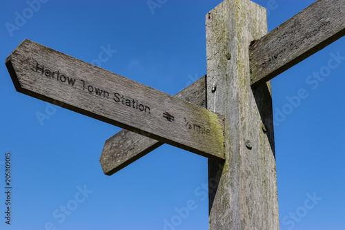 Sign directing to Harlow train station photo