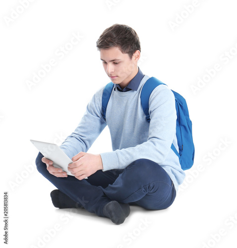 Stylish teenager with backp...