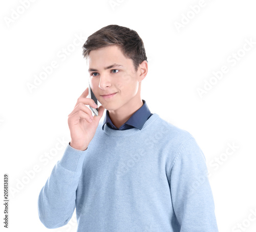 Stylish teenager talking on...