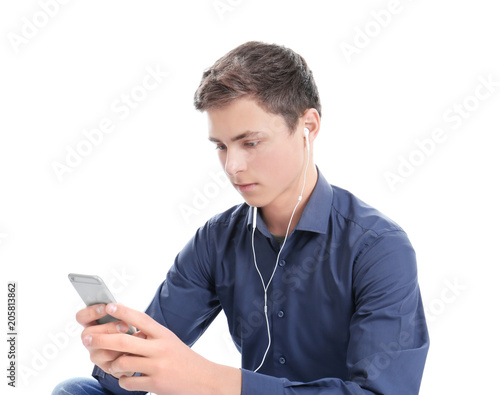 Stylish teenager using mobi...