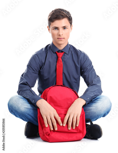 Stylish teenager with backp...