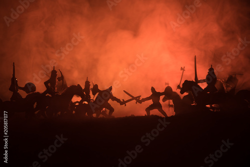 Fotografering Medieval battle scene with cavalry and infantry