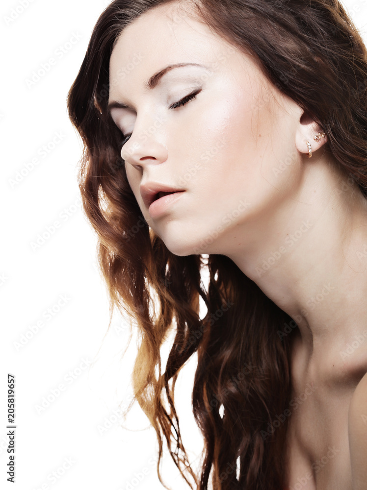Face of a sexy beautiful young woman with clean skin on a white Face of a sexy beautiful young woman with clean skin on a white