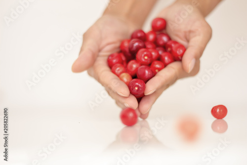  A handful of cherries in a cherry basket A cherry in a handful of cherry fruits A cherry in a handful of fruits