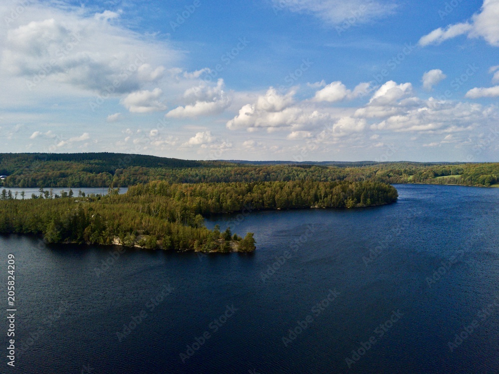 Aerial view over lake and nature reserve in south Sweden