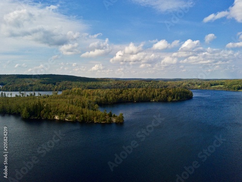 Aerial view over lake and nature reserve in south Sweden © Guillaume