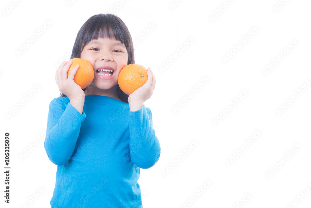 Little girl playing with fresh mandarin fruits Little girl playing with fresh mandarin fruits