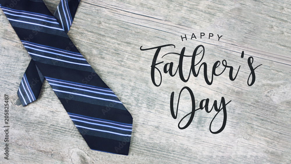 Happy Father's Day Text with Striped Tie Over Light Wood Background - obrazy, fototapety, plakaty 