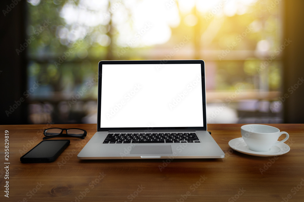 Laptop with blank screen on table. Workspace background new project on laptop computer with blank copy space screen for your advertising text message Laptop with blank screen on table. Workspace background new project on laptop computer with blank copy space screen for your advertising text message