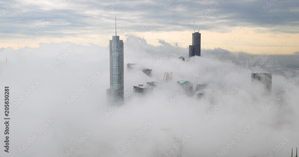 Chicago downtown buildings skyline thick fog cloud