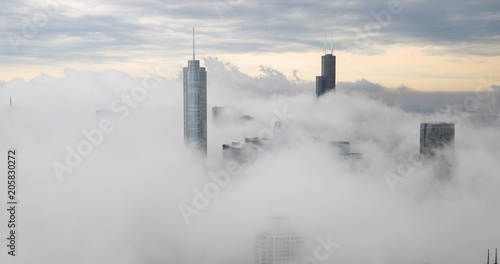 Chicago downtown buildings skyline thick fog cloud