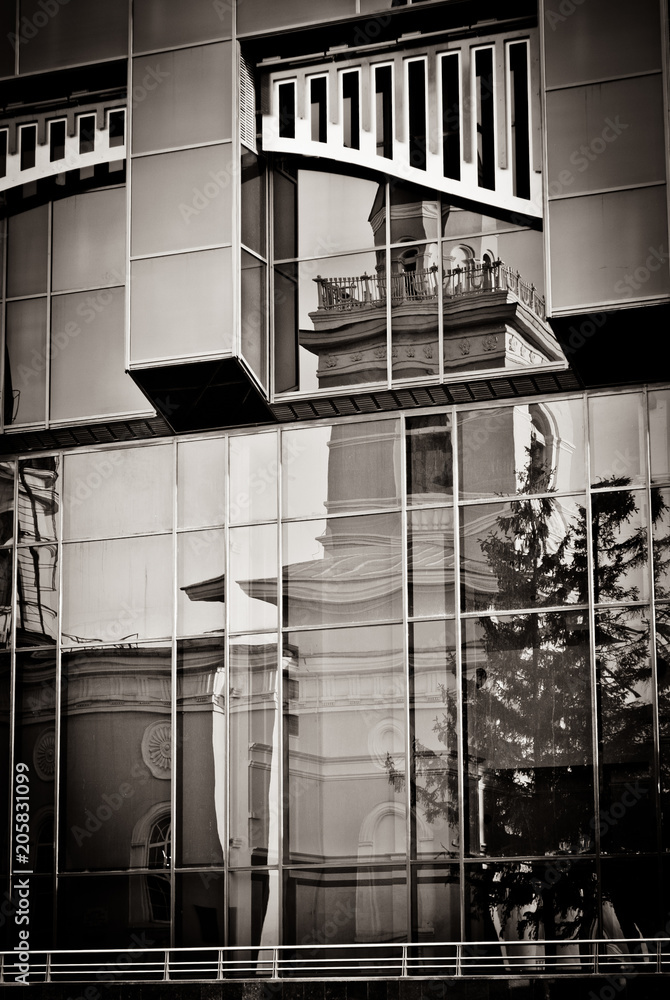 reflection of the city in a mirror building