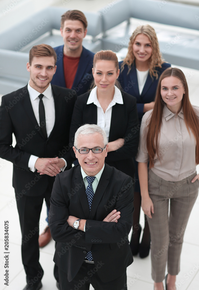 view from the top. group of smiling business people looking at camera. view from the top. group of smiling business people looking at camera.