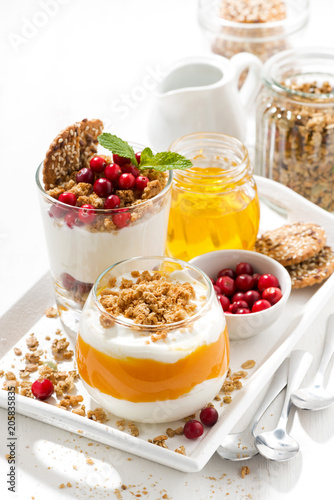 desserts with pumpkin  berries and biscuits  vertical