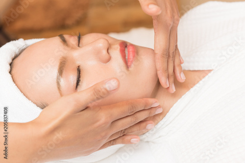 Wallpaper Mural Face massage. Spa skin and body care. Close-up of young woman getting spa massage treatment at beauty spa salon. Facial beauty treatment. Torontodigital.ca