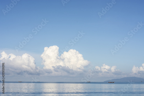Summer seascape ,blue sea ,green island with blue sky background,Thailand