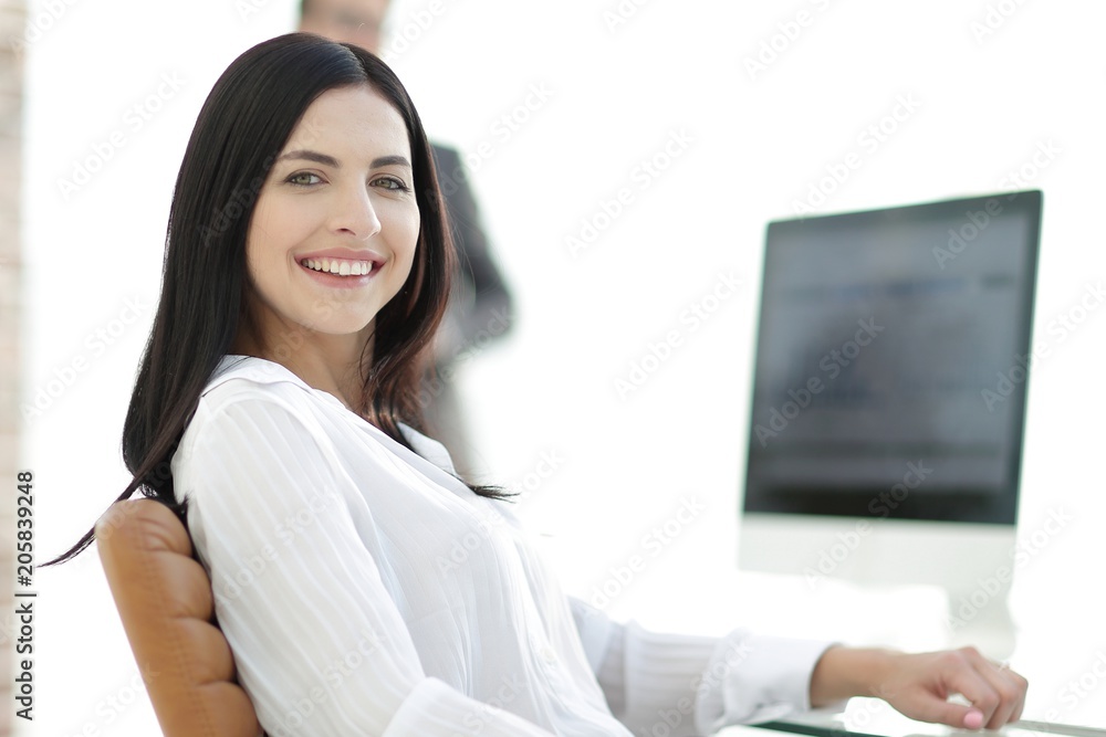 successful young business woman sitting at workplace successful young business woman sitting at workplace