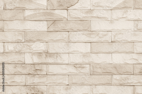 Brick wall art concrete stone texture background in wallpaper limestone abstract paint to flooring and homework/Brickwork or stonework clean grid uneven interior rock old.