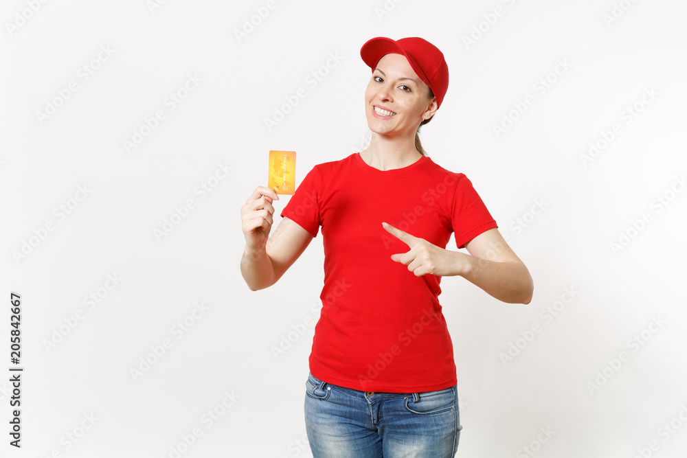 Delivery woman in red uniform isolated on white background. Professional smiling caucasian female in cap, t-shirt, jeans working as courier or dealer, showing credit card. Copy space for advertisement Delivery woman in red uniform isolated on white background. Professional smiling caucasian female in cap, t-shirt, jeans working as courier or dealer, showing credit card. Copy space for advertisement