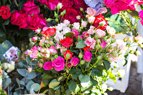 Beautiful bouquets of flowers on the market. Showcase with flowers. Sale of flowers. Flower shop.