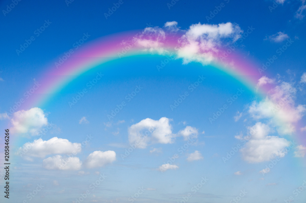 Blue sky and white cloud with rainbow
