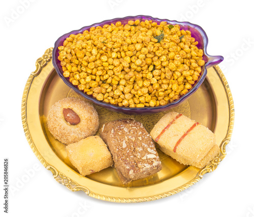 Indian Traditional Namkeen Food Chana Masala With Sweet Cookies isolated on White Background