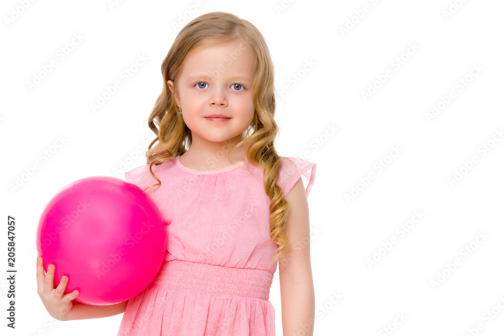 little girl is engaged in fitness with a ball. little girl is engaged in fitness with a ball.