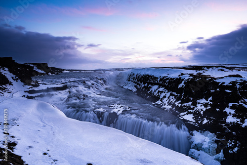 Gullfoss waterfall in the morning one of the most famous waterfall in Icaland / This place is the land of America and Europe are attached photo