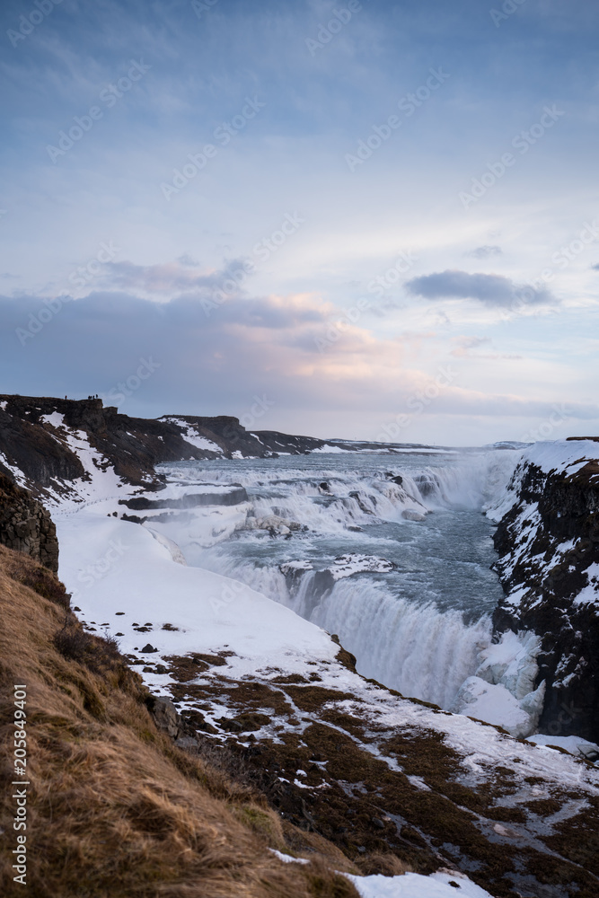 Gullfoss waterfall in the morning one of the most famous waterfall in Icaland / This place is the land of America and Europe are attached