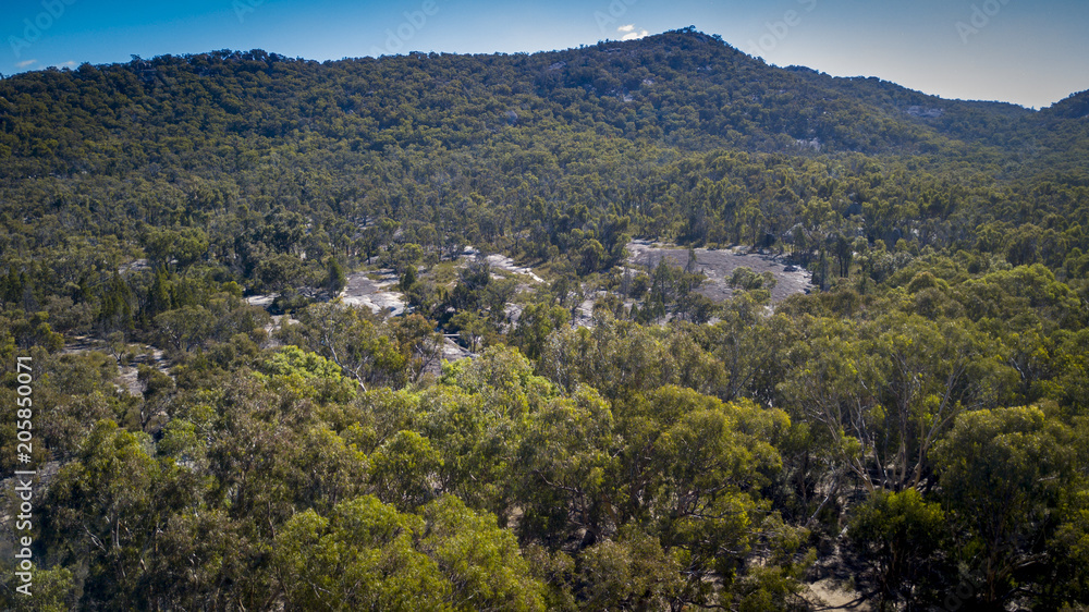 Aerial drone view over wineries and granite rock in Stanthorpe, Australia