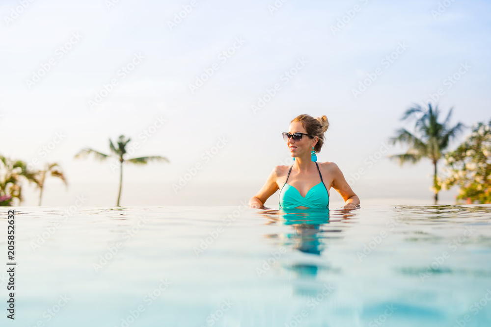 Woman in luxury tropical resort Woman in luxury tropical resort