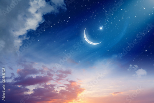Ramadan Kareem background with crescent moon and stars