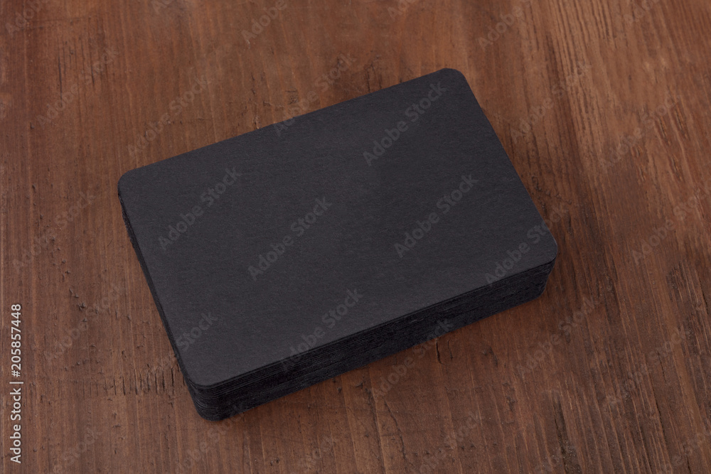 Black business cards mockup on a dark background Black business cards mockup on a dark background