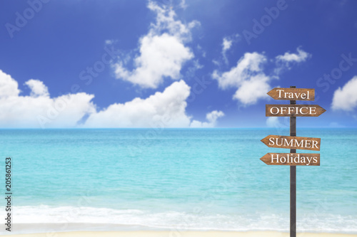 Wooden blank sign with text Travel and office and summer and holidays , blue sea and sand beach with airplane over the sea , Vacation and Inspiration Concept.