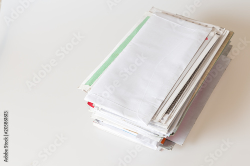 Pile of mails on white background