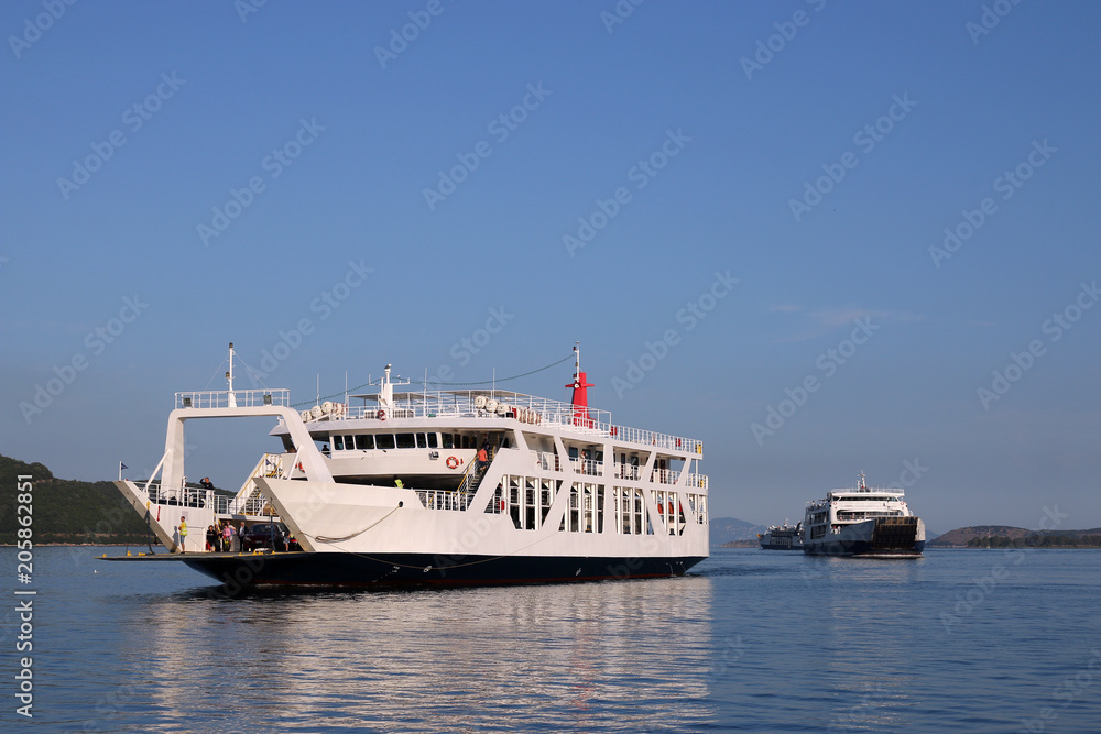 Ferry boats sails on the Ionian Sea Greece summer season