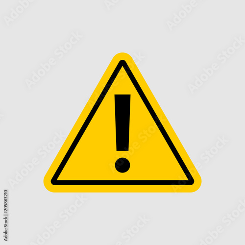 warning - vector icon. warning yellow sign on gray background