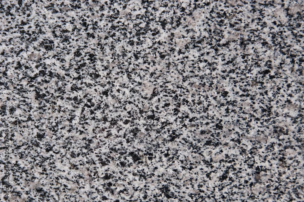 Flecked stone texture in gray and black colors