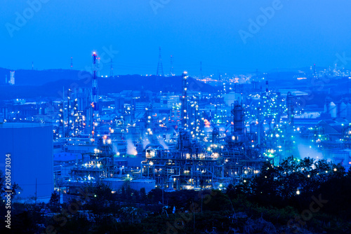Aerial view Oil refinery.Industrial view at oil refinery plant form industry zone with sunrise and cloudy sky. and Petrochemical background sunset.