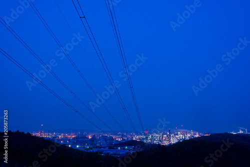 Aerial view Oil refinery.Industrial view at oil refinery plant form industry zone with sunrise and cloudy sky. and Petrochemical background sunset.
