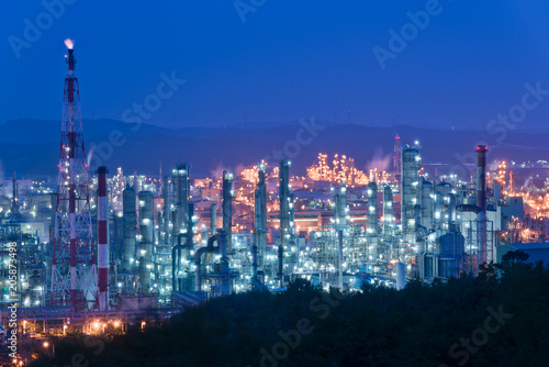 Aerial view Oil refinery.Industrial view at oil refinery plant form industry zone with sunrise and cloudy sky. and Petrochemical background sunset.
