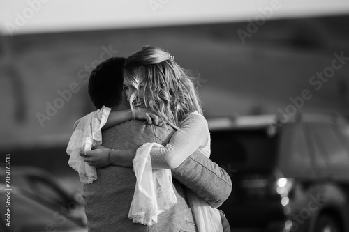Tableau sur toile Black and white photo, the reaction of the man and the woman after she said yes