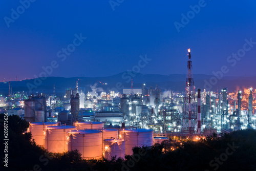 Aerial view Oil refinery.Industrial view at oil refinery plant form industry zone with sunrise and cloudy sky. and Petrochemical background sunset.