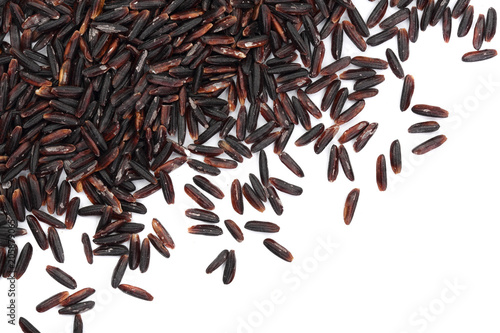 Black wild rice isolated on white background with copy space for your text. Top view. Flat lay