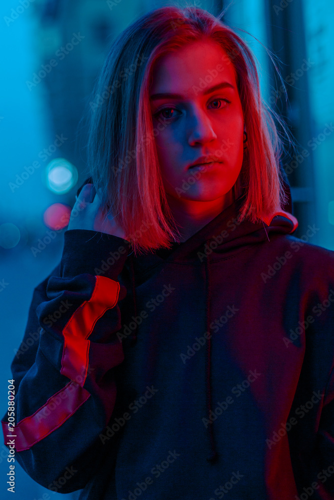 portrait of a girl in red blue in the street portrait of a girl in red blue in the street