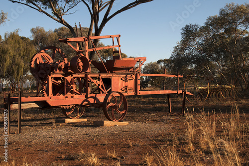 Quorn South Australia, obsolete farming equipment left to rust in the afternoon sunlight