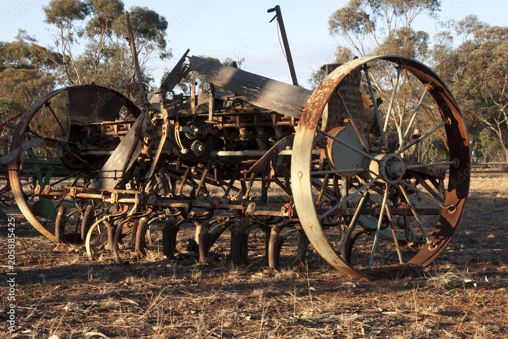 Quorn South Australia, obsolete harrow or scarifier equipment left to rust in the afternoon light