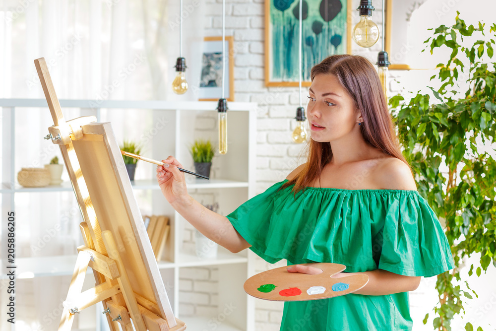 Creative woman working in art studio Creative woman working in art studio